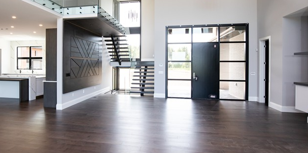 dark coloured engineered hardwood flooring in a front entrance of a modern home