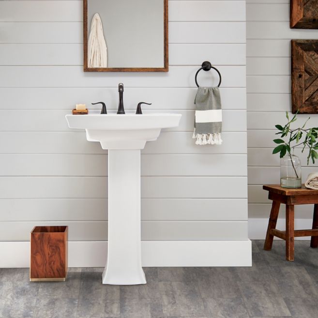 powder room with luxury vinyl tile flooring