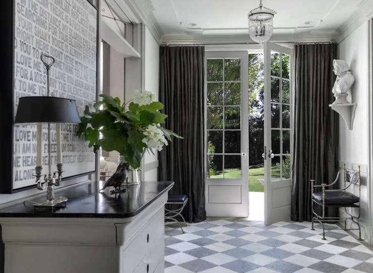 Gwenyth Paltrow's front foyer with gray and white checkered tile